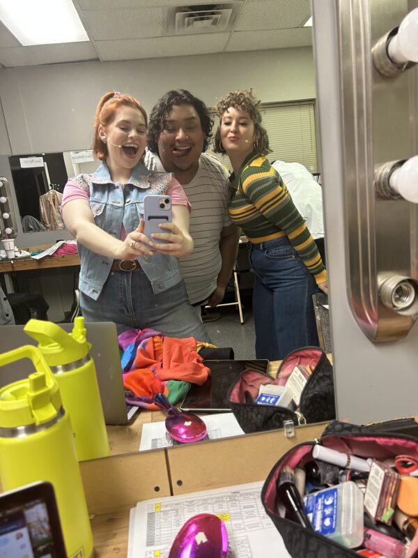 cast members clown around backstage