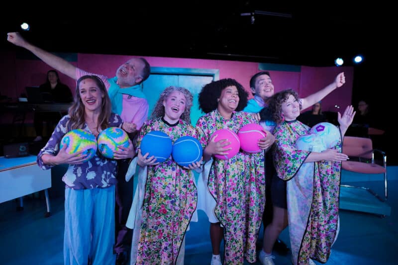 Prodution photo featuring full cast or cleaVage